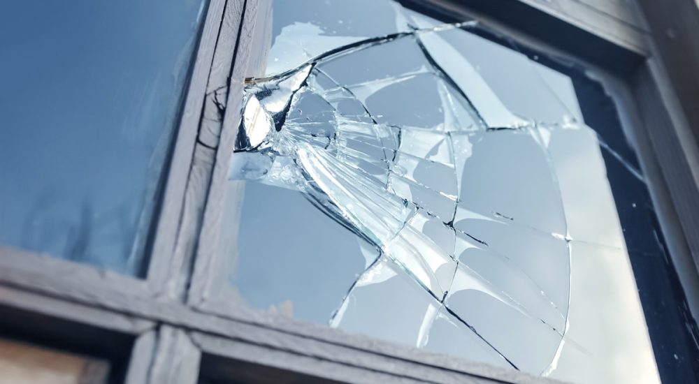 a broken window that home insurance might cover